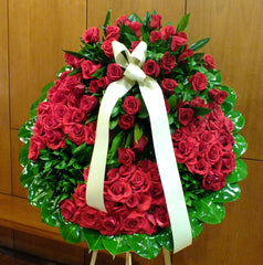 Corona fúnebre en rosas